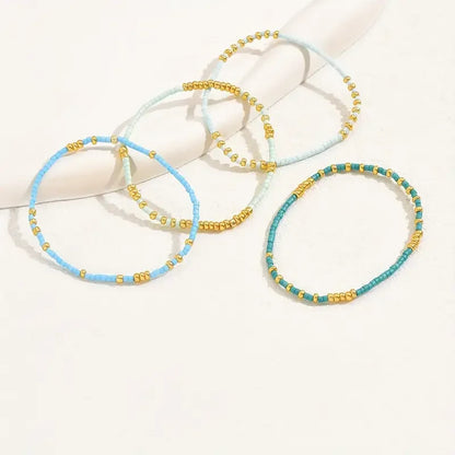 4 PCS Turquoise Color Seedbeads Stretch Bracelet Set Bohemia Gold Color Glassbeads Elastic Handmade Girls Vacation Jewelry.