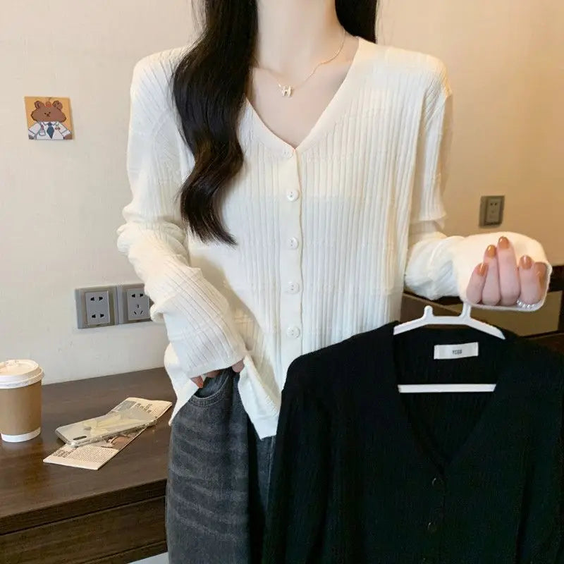 Women's Long-sleeved Button Cardigan Solid Color Casual Loose Fashion Top.