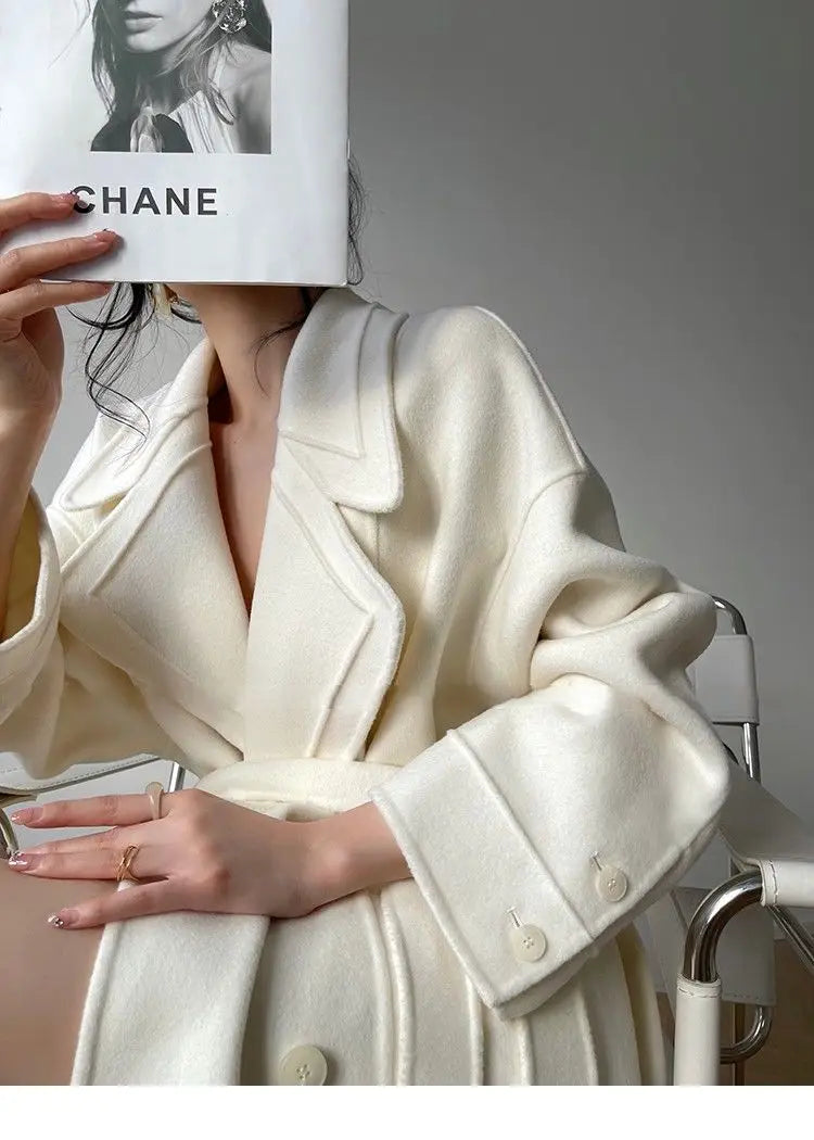 Weißer Mantel im französischen Stil, High-End-Temperament, Herbst-Winter, langer Wollmantel, 2025, neuer Damen-Wollmantel, modische lose Oberbekleidung.