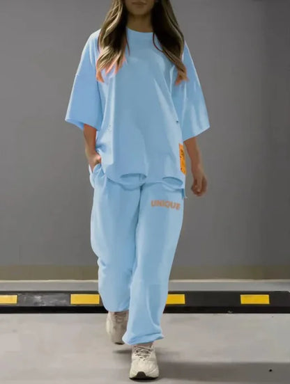 Summer New Fashion Hollowed Out O Neck T Shirt Women's 2 Piece Set Solid Color Casual Relaxed Tracksuit Pants Pocket Female Suit.