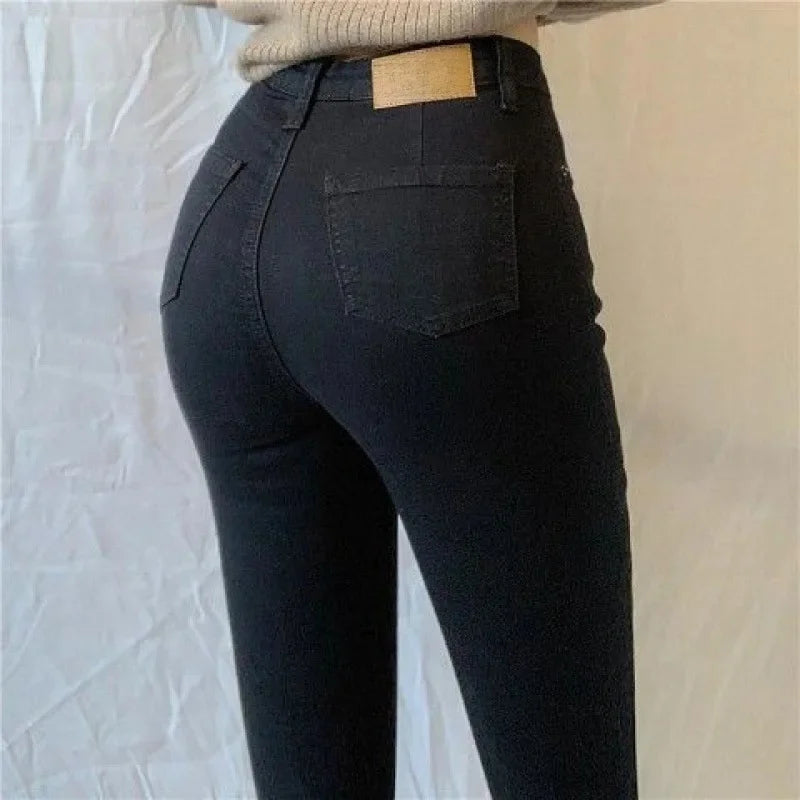 High Waist plus Size Denim Jeans Women's Fitting Pencil Pants Elastic Casual Long Trousers Light Blue Spring Autumn Wear.