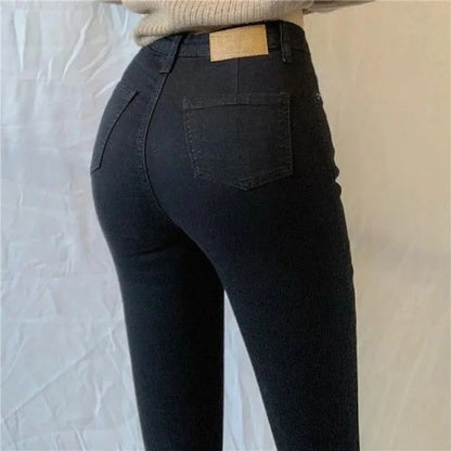 High Waist plus Size Denim Jeans Women's Fitting Pencil Pants Elastic Casual Long Trousers Light Blue Spring Autumn Wear.