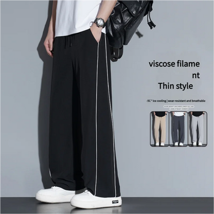 Summer ice silk thin section pants men's Hong Kong style loose splicing casual sports wide-legged pants elastic speed pants.