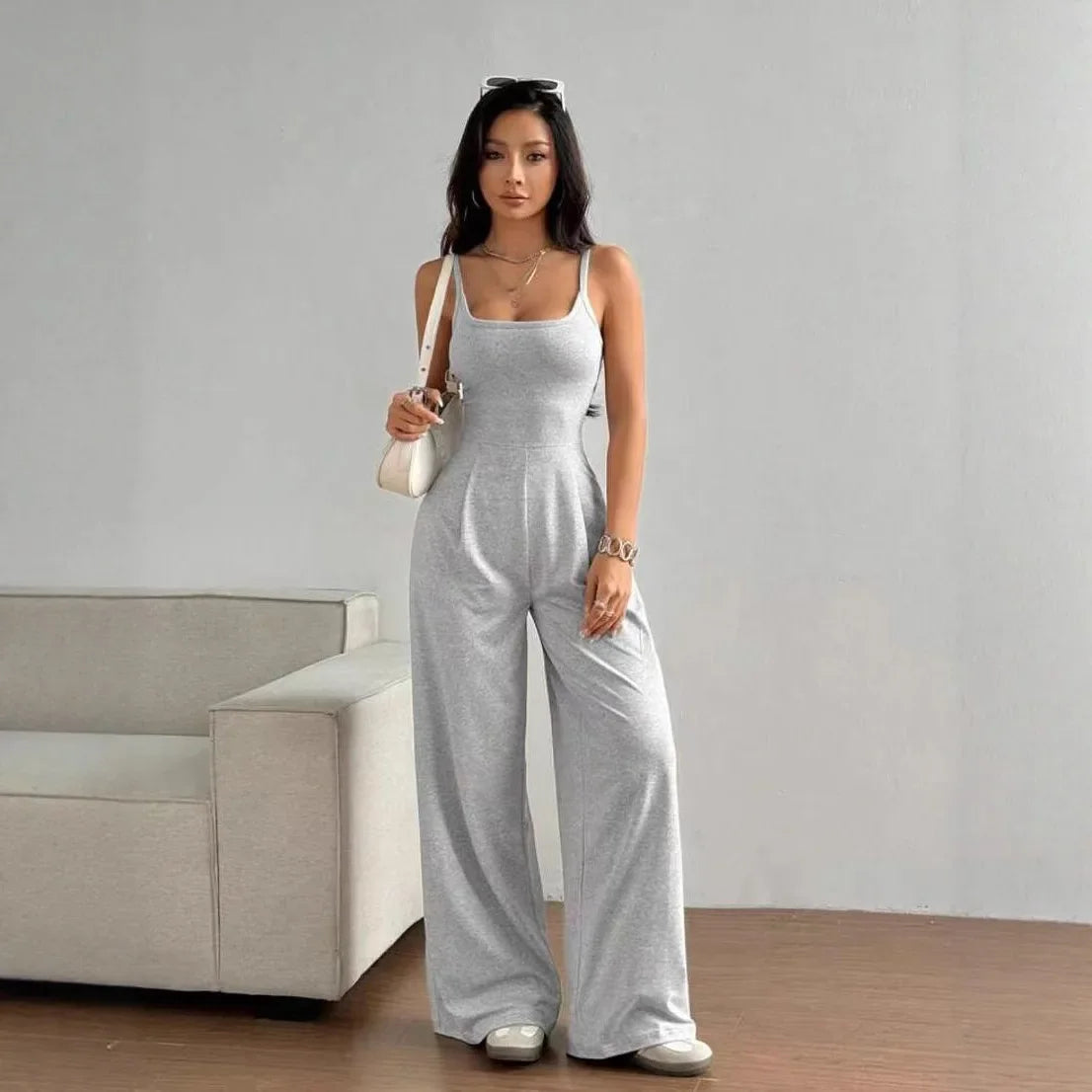 Fashionable Solid Color High Waist Bell Bottom Jumpsuit Backless Strap Casual Women's Long Pants One Piece Suit Female.