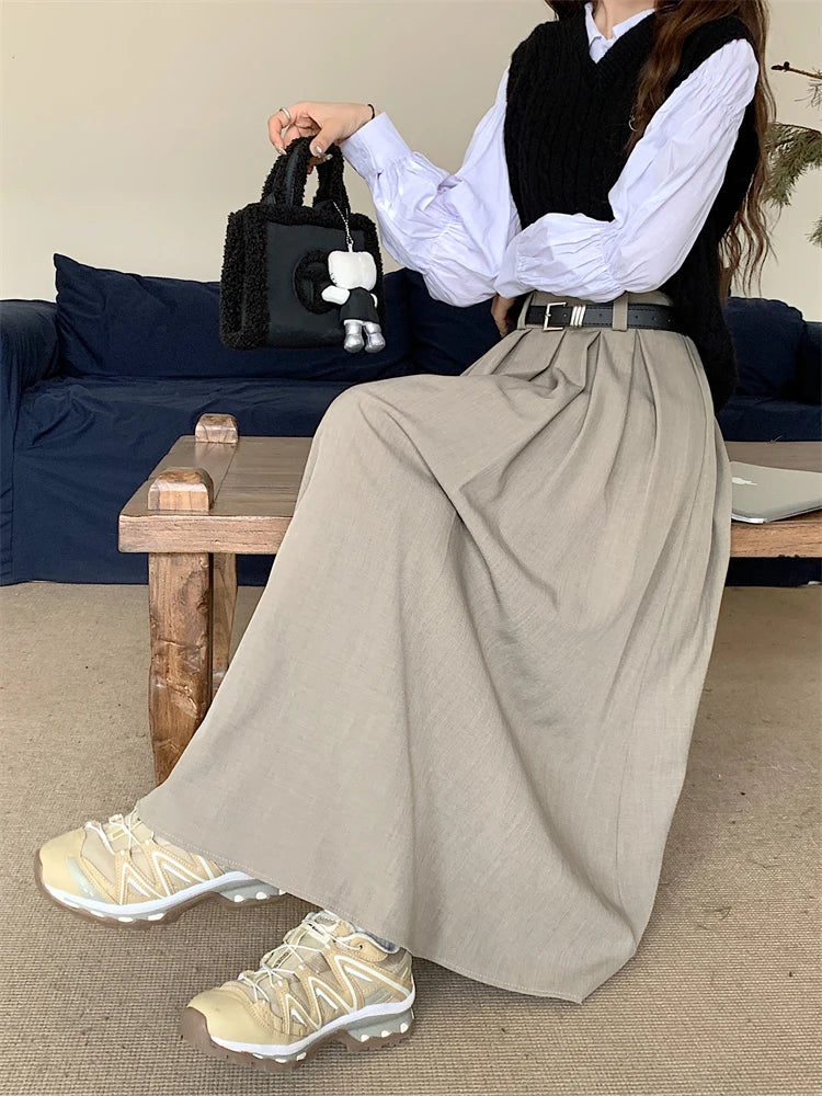 2024 New Korean Skirt Women Solid Color Versatile Mid-length Pleated Skirt Large Swing Type Skirt Female Long Skirts for Women.