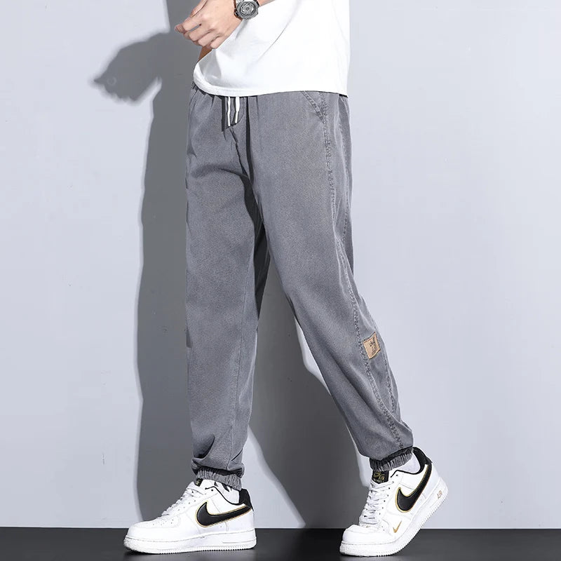 Men's Lyocell Loose Cuffed Tapered Pants 2025 Summer Autumn Comfortable Breathable Casual Long Pants Plus Size 5XL.