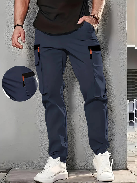 Outdoor-Arbeitshose für Herren – strapazierfähiges Polyester, mehrere Taschen, elastischer Bund mit Schlaufen, leicht und atmungsaktiv.