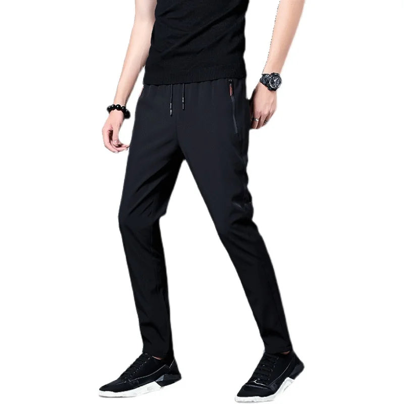 Summer men's ice silk quick drying casual pants slim fit Korean version ice silk pants sports pants straight tube quick drying p.