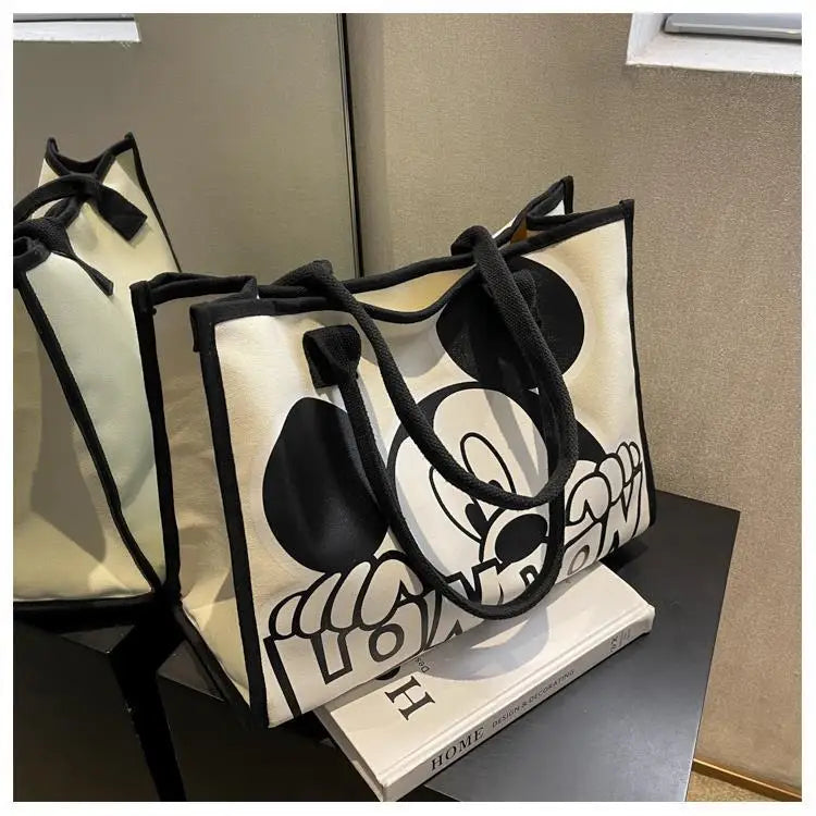 New Disney  Mickey Canvas Bag Women's Versatile Casual Shoulder Bag Commuter Handbag Large Capacity Multifunctional Mommy Bag.