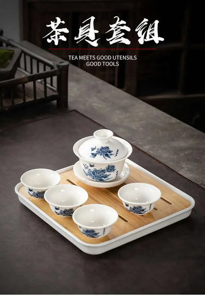 1 gaiwan 4 cups 1 teaboad Ceramic kungfu tea set household  one cover bowl four cups living room kungfu office reception.