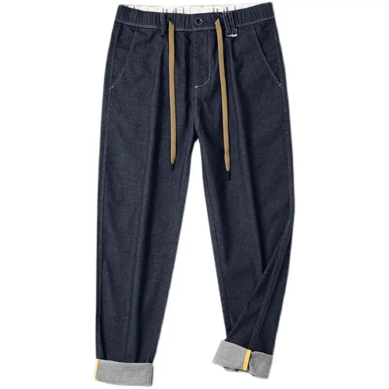 Frühling Herbst neue Mode einfarbige elastische Taille Jeans Herren bekleidung Kordel zug Taschen Chaopai lässig lose gerade Hosen.